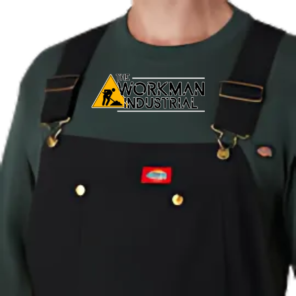 Close-up of the bib chest pockets and brass hardware on the Dickies overalls.