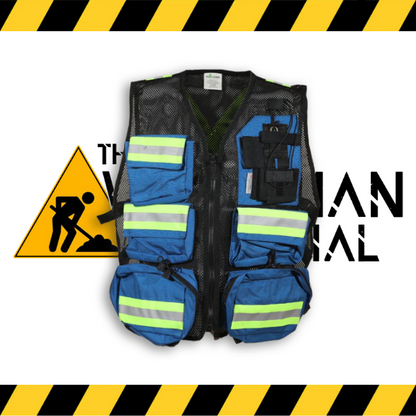 The blue Big K first aid safety vest with multiple pockets.